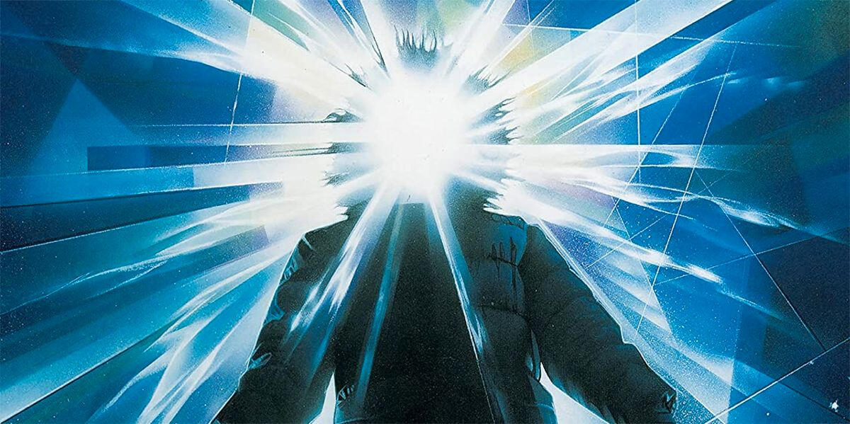 The cover for the film, The Thing, depicting MacReady in a winter coat and beams bursting out of where his head should be.